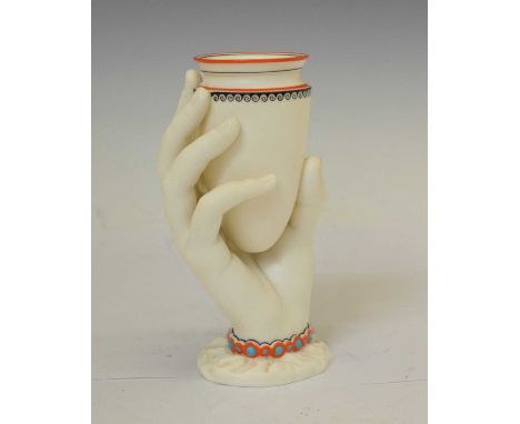 Royal Worcester porcelain hand-form vase, the hand with a bracelet, brown printed backstamp and impressed marks, 14cm high