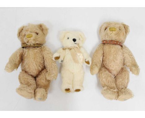 Two Chad Valley blonde mohair teddy bears with studded collars, 36cm high, together with white Merrythought teddy bear, 28cm 