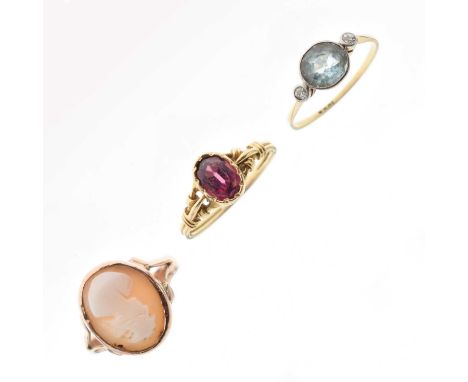 9ct rose gold cameo ring, size R, an 18ct gold ring set purple coloured stone, and a three stone ring stamped '18ct', 7.7g gr