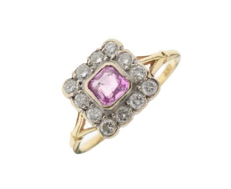 Pink sapphire and diamond cluster ring, the square cut sapphire within a border of twelve old cut diamonds, stamped '18ct', s