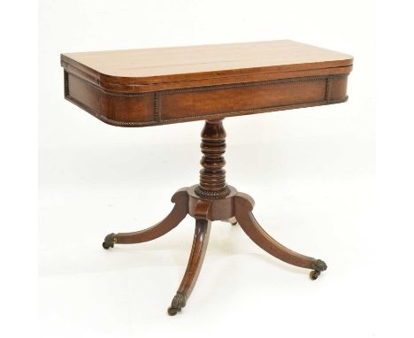 William IV rosewood fold-over card table, with green baize-lined surface over beaded frieze and turned stem with gadrooned co