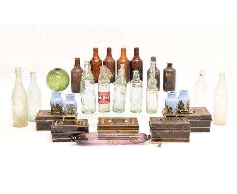 Quantity of glass advertising bottles, together with a purple glass rolling pin, ceramics jars/vessels and money boxes 