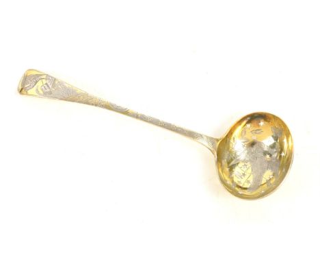 Georgian silver sifter ladle with star form holes, with gilt finish, bowl etched and decorated with a large bird in flight ch