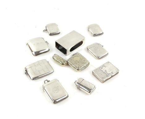 Collection of seven silver vesta cases and a silver matchbox holder, to include one vesta with floral decoration and vacant c