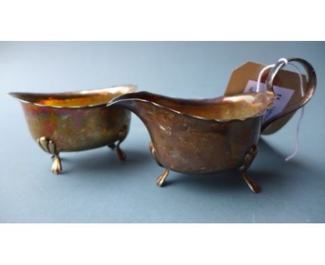 A hallmarked silver sauce boat and a silver sugar bowl