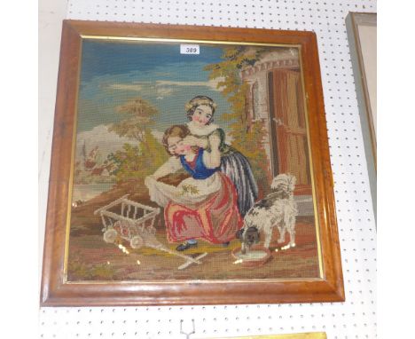 A 19th century Berlin wool needlepoint scene depicting two girls playing in an Idyllic setting in a walnut frame
