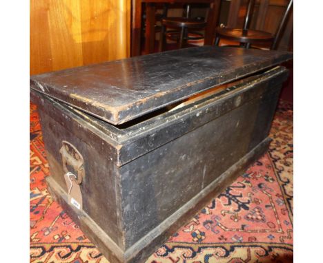 A large ebonised carpenters tool chest fully equipped with tools 