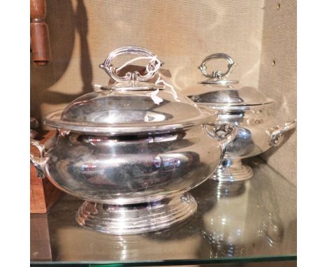 A pair of silver plated twin handled soup tureens 