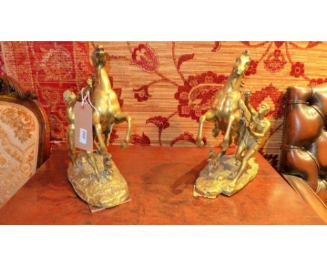 A pair of late 19th century gilt brass marley horses with handler beside on a naturalistic base, Item 1 - H 38 x L 34 x W 14c