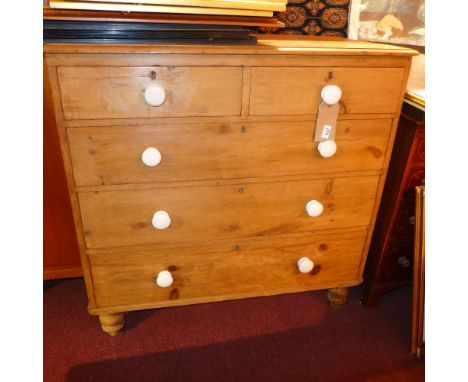 A Victorian pine chest fitted two short and three long drawers with ceramic knob handles 