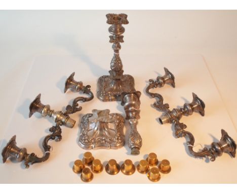 A pair of Austrian three light table candelabra, each with scrolled decoration and alternative single candlestick fittings (o