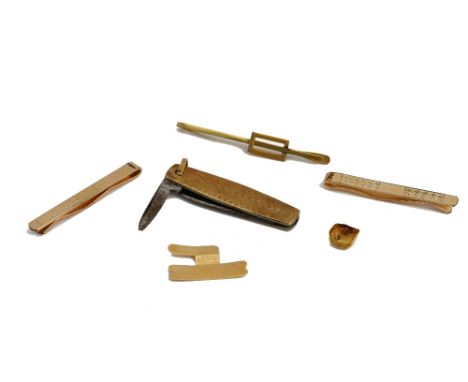 A gold fitting, detailed 750, weight 1.6 gms, another gold fitting, a gold mounted folding pocket knife, detailed 585, two ma