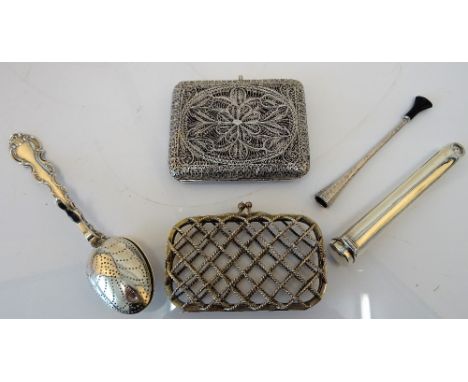 A rectangular filigree cigarette case, a rectangular lady's purse, of criss-cross ropetwist wirework design,(the interior lin