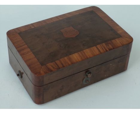 A Swiss burr wood music box, late 19th century, playing two airs, on a three inch brass roller, 12.5cm wide, (key). Condition