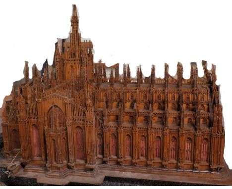 A large boxwood scale model of Milan Cathedral, approximately 138cm wide x 88cm high.  Condition Report Numerous losses and d