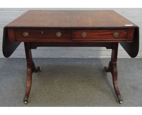 A George III mahogany sofa table, with opposing opposite frieze drawers, on four downswept supports, 92cm wide x 72cm high. 