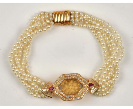 A Jaeger-Le Coultre gold, diamond and ruby set lady's wristwatch case, mounted with circular cut and baguette diamonds and wi