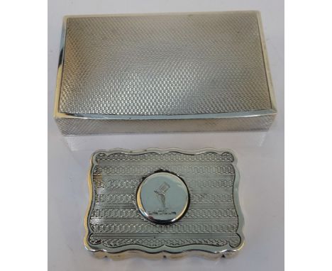 A silver rectangular hinge lidded box, the interior gilt, the exterior engine turned, length 8cm, London 1926 and a late Vict