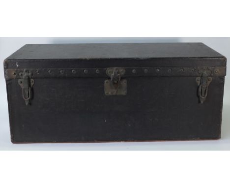 An early 20th century Louis Vuitton black leather motoring trunk, with sloping back, chrome rivets and lock plate, the canvas