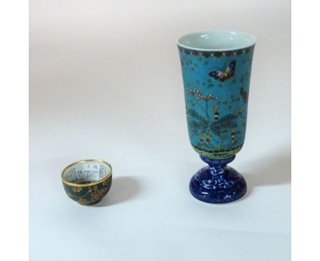 A small Japanese kutani bowl, Meiji period, the interior gilt with flowers beneath a Chinese poem, the exterior enamelled wit