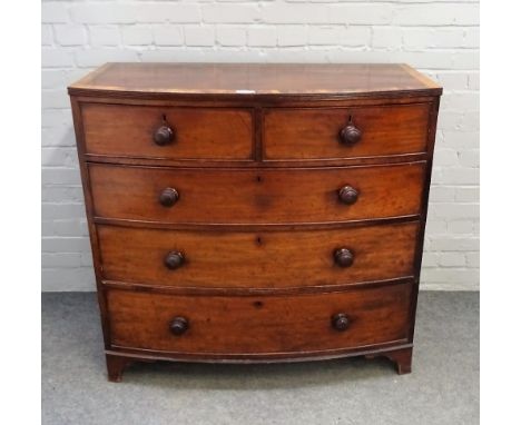 An early Victorian fruitwood banded mahogany bowfront chest of two short and three long graduated drawers, on bracket feet, 1