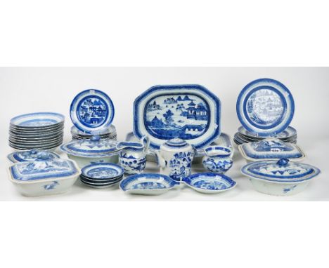 A large composite set of Canton blue and white export porcelain, 19th century, each piece painted with a river landscape, com