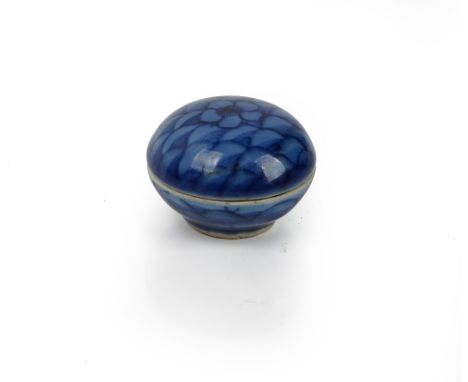 A small Chinese Transtional blue-ground circular box and cover probably from the Hatcher Cargo, circa 1643, painted with a ce
