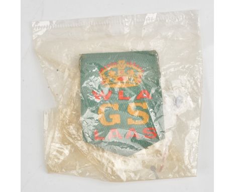 A First World War period Women's Land Army good service ribbon award badge, the back with safety pin fitting. 