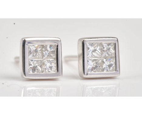 A pair of white gold and diamond earstuds, each mounted with four princess cut diamonds, in a square design, detailed 750 18 