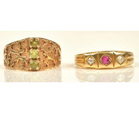 A Victorian 18ct gold ring, mounted with a cushion shaped ruby between two cushion shaped diamonds, Birmingham 1891, gross we