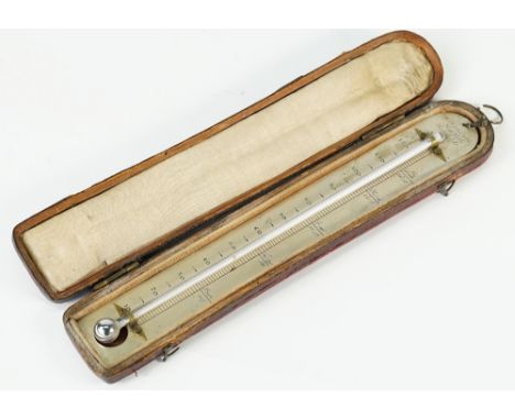 A leather cased thermometer by S. Holdsworth, New Wells, Wakefield, early 19th Century, the silvered scale 20cm high. Conditi