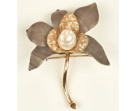 A baroque cultured pearl, gold, oxidised precious metal and diamond set brooch of flower design, set with a central baroque p