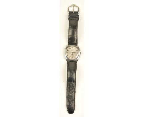 A Dunhill steel cased gentleman's 1950's style wristwatch, the signed silvered dial with black Arabic numerals, subsidiary se