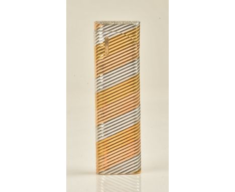 A Colibri two colour gold and diamond set, curved rectangular cased gas lighter, the sliding sprung top pave set with circula