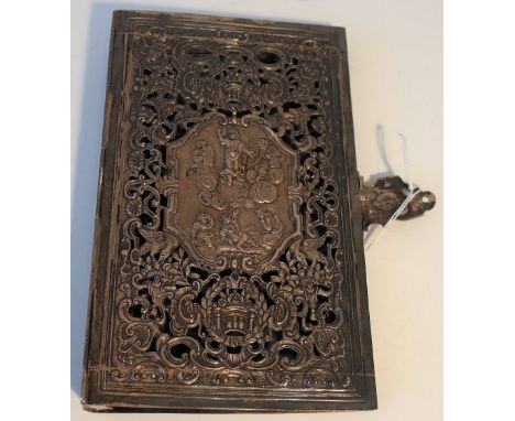 A silver rectangular book binding, 19th century, of Italian style, openwork cast and chased with religious scenes within a sh