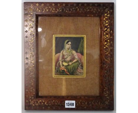 An Indian miniature painting, late 19th century, gouache on paper laid on to card, painted with a portrait of a Mughal Empres