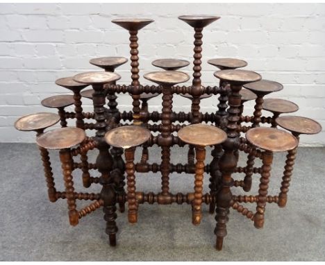 A stained beech bobbin turned multi-tier plant stand, 100cm wide x 85cm high. Condition Report Old traces of worm, some of th