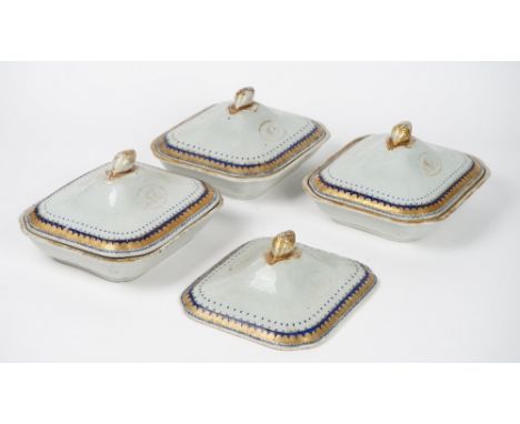 Three Chinese export rectangular tureens and four covers, circa 1800, each gilt with indistinct intials inside blue enamel an