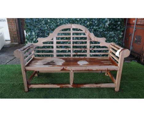 A Lutyens design teak framed hardwood garden bench, 165cm wide x 104cm high. 