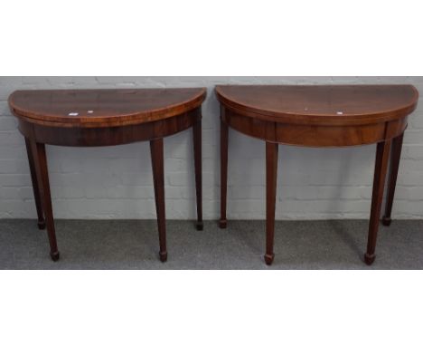 A near pair of George III kingwood banded mahogany 'D' shaped card tables on tapering square supports, each 91cm wide x 74cm 