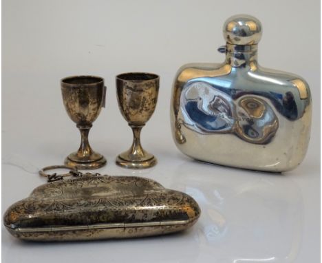 Silver and silver mounted wares, comprising; a curved rectangular spirit flask, Sheffield 1900, a lady's purse with engraved 