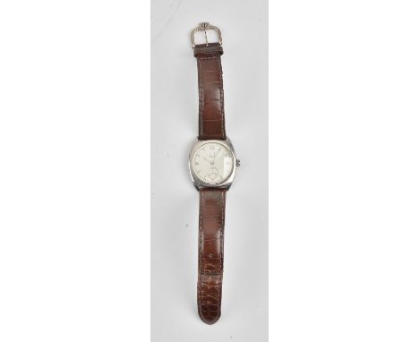 A Dunhill Quartz steel cushion shape cased gentleman's wristwatch, the signed silvered dial with silvered Arabic and arrow sh