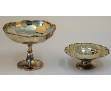 A silver sweetmeat stand, Elkington &amp; Co, Birmingham 1912, with panelled sides on a spreading foot, 14.5cm diameter and a