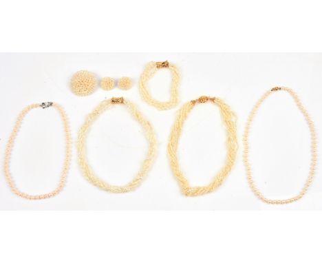A single row necklace of uniform cultured pearls on a gold spherical clasp, detailed 750, two multiple row necklaces of fresh