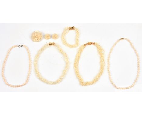 A single row necklace of uniform cultured pearls on a gold spherical clasp, detailed 750, two multiple row necklaces of fresh