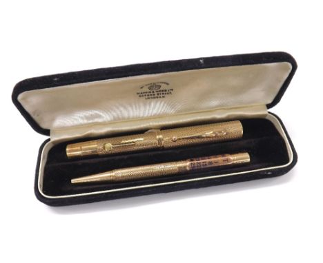 Waterman's 9ct gold 'Ideal' fountain pen, hallmarked for London 1937, maker FDW, with presentation inscription; also a matchi