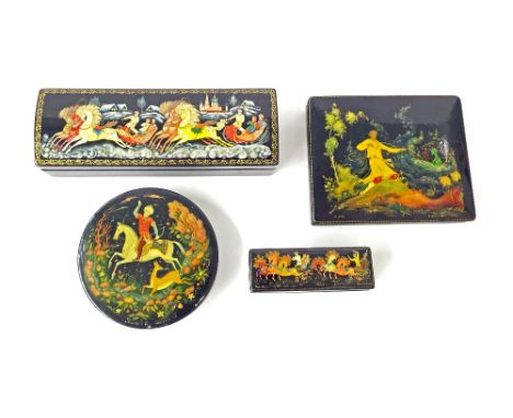 Interesting Russian antique circular papier maché box and cover, decorated with a hunter in traditional costume on horseback 