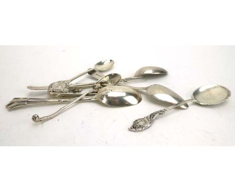 A mixed parcel of early 20th century silver comprising a souvenir spoon for Mill Hill Lodge, three further spoons, a thistle 