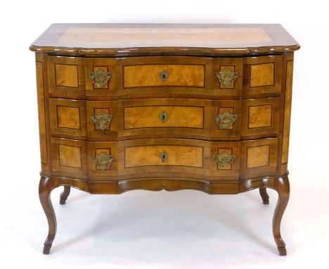 A mid-19th century South German burr walnut, maple, crossbanded and boxwood inlaid break-front commode of 'arc-en-arbalette' 