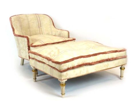 A late Victorian white-painted and gilt embellished long-seated armchair of Louis XVI-style, the arched button upholstered ba